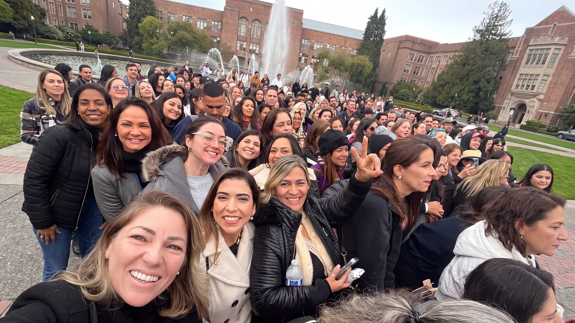 Group of Brazilian and Latin American students smiling together on a U.S. college campus